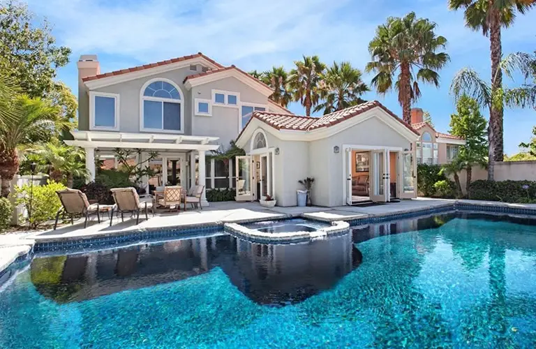Impact windows providing storm protection with reinforced glass designed to withstand high winds and flying debris.